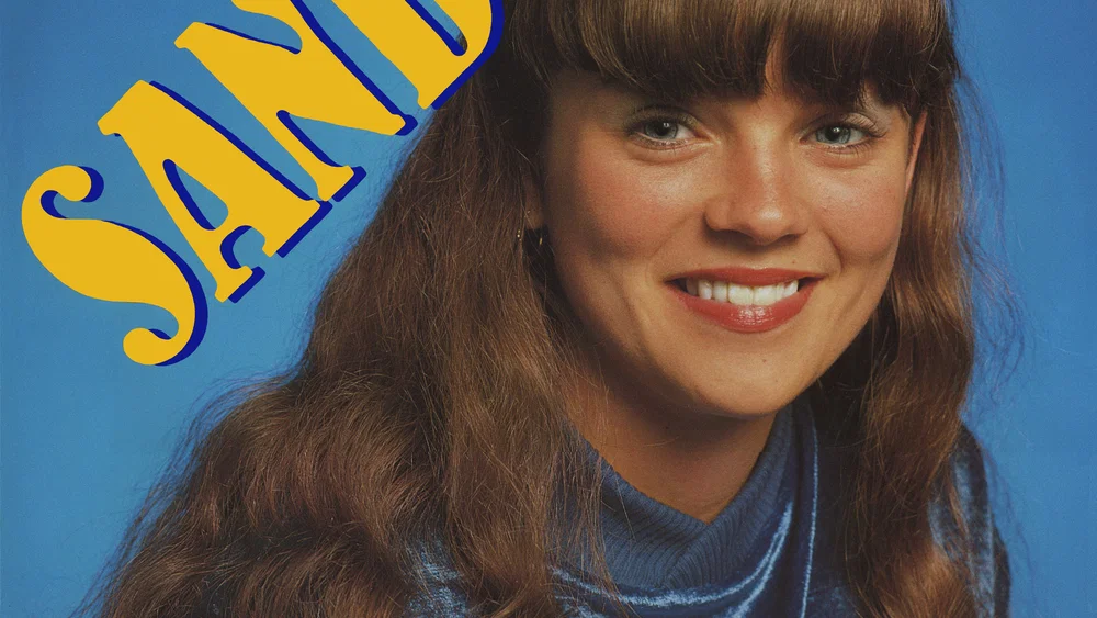 Sandy - Remastered background