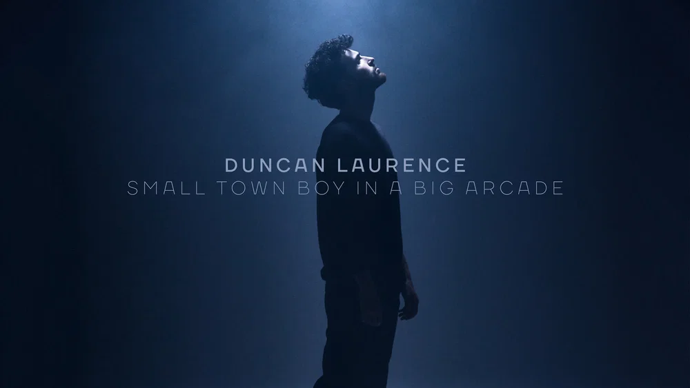 Small Town Boy In A Big Arcade background