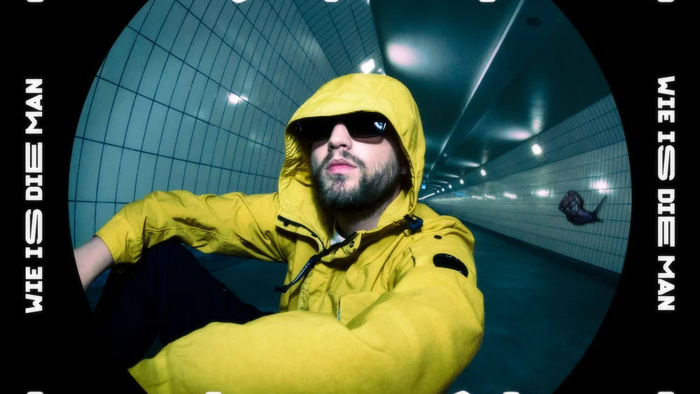 Wie Is Die Man background