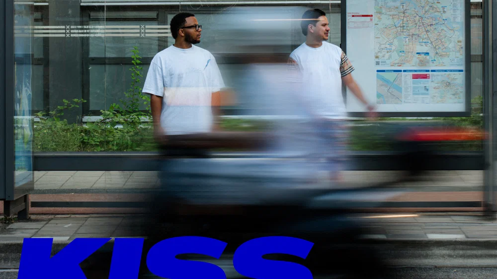 Kiss & Tell background