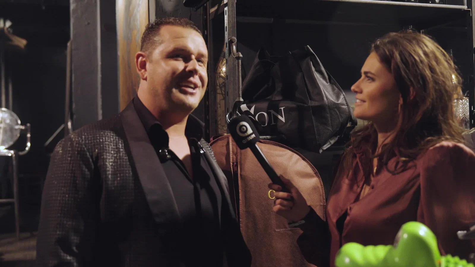Backstage Met John West background